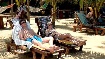 On the beach, white sand