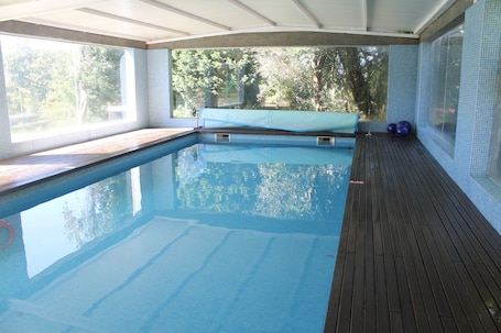 Indoor pool, outdoor pool, pool umbrellas, sun loungers