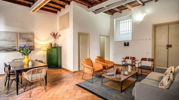 Family Apartment, 4 Bedrooms, Terrace, City View | Living area | 50-inch flat-screen TV with satellite channels, TV, Netflix