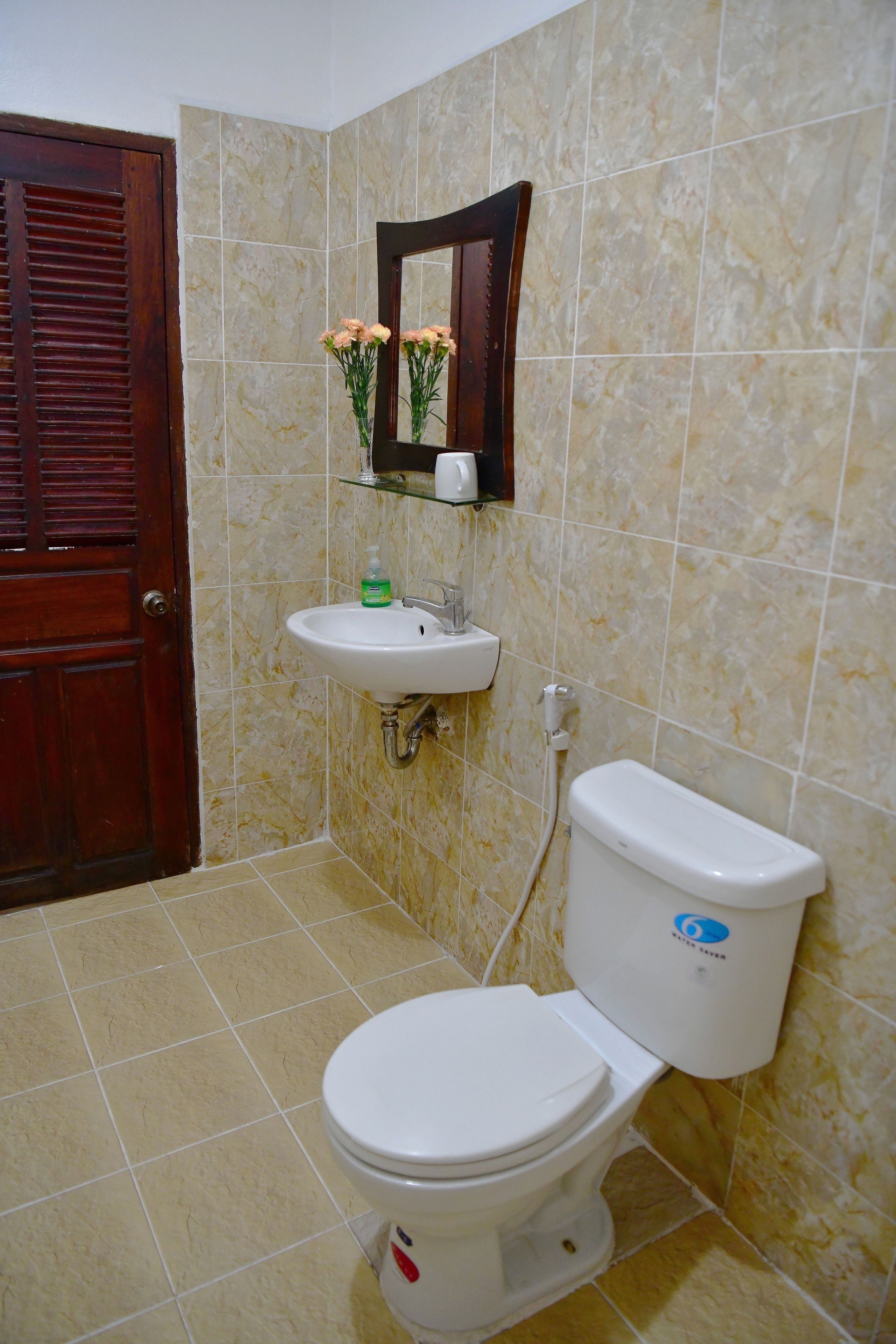 hydromassage showerhead, designer toiletries, hair dryer, slippers