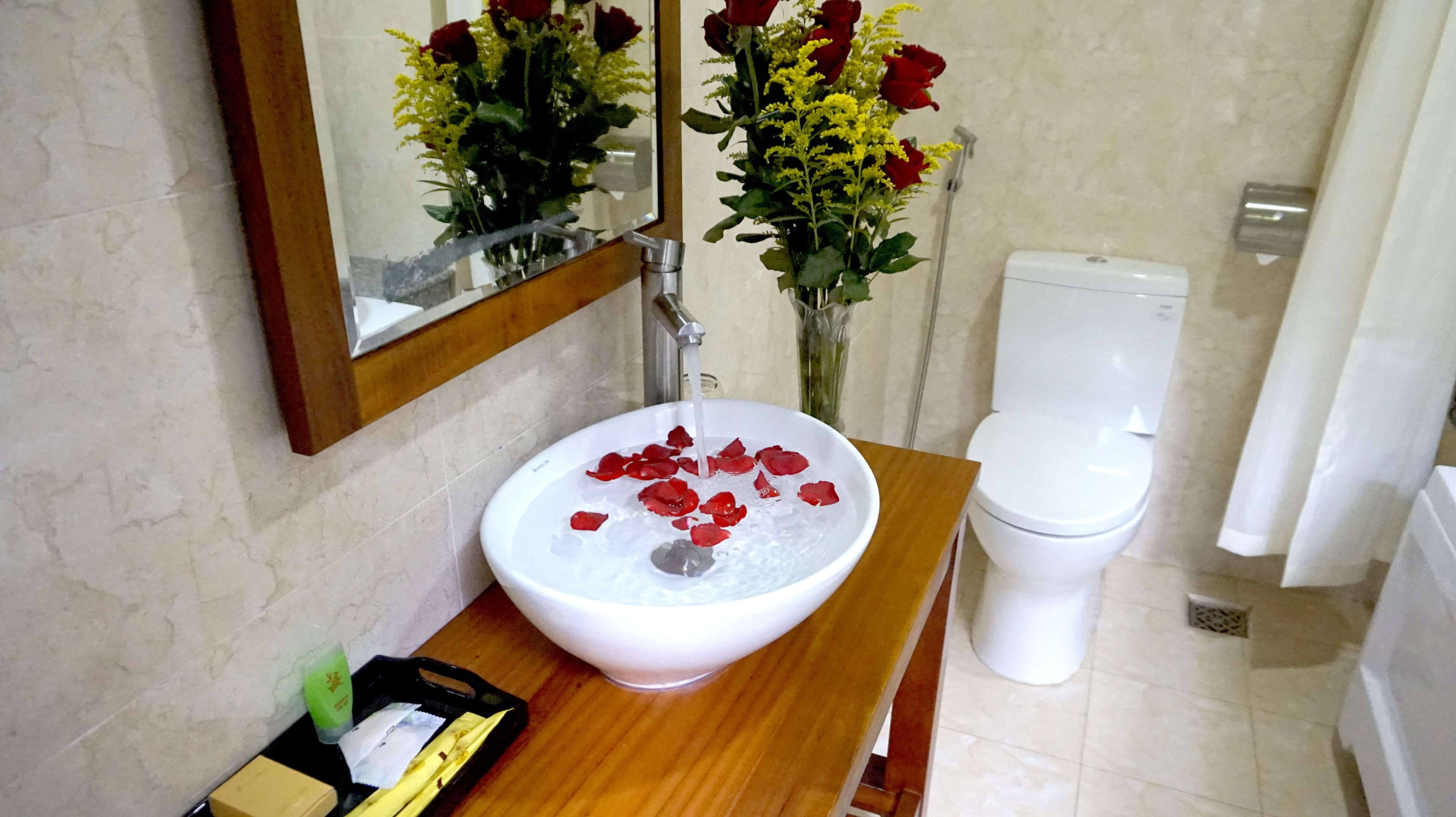 deep-soaking bathtub, rainfall showerhead, free toiletries, hair dryer