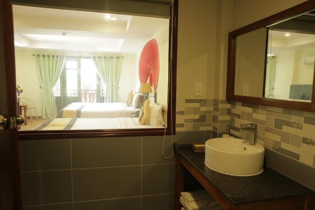 family triple room | bathroom | deep-soaking bathtub, rainfall showerhead, free toiletries, hair dryer