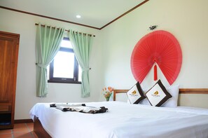 Minibar, in-room safe, desk, laptop workspace - Vela Phu Quoc Resort (Phu Quoc)