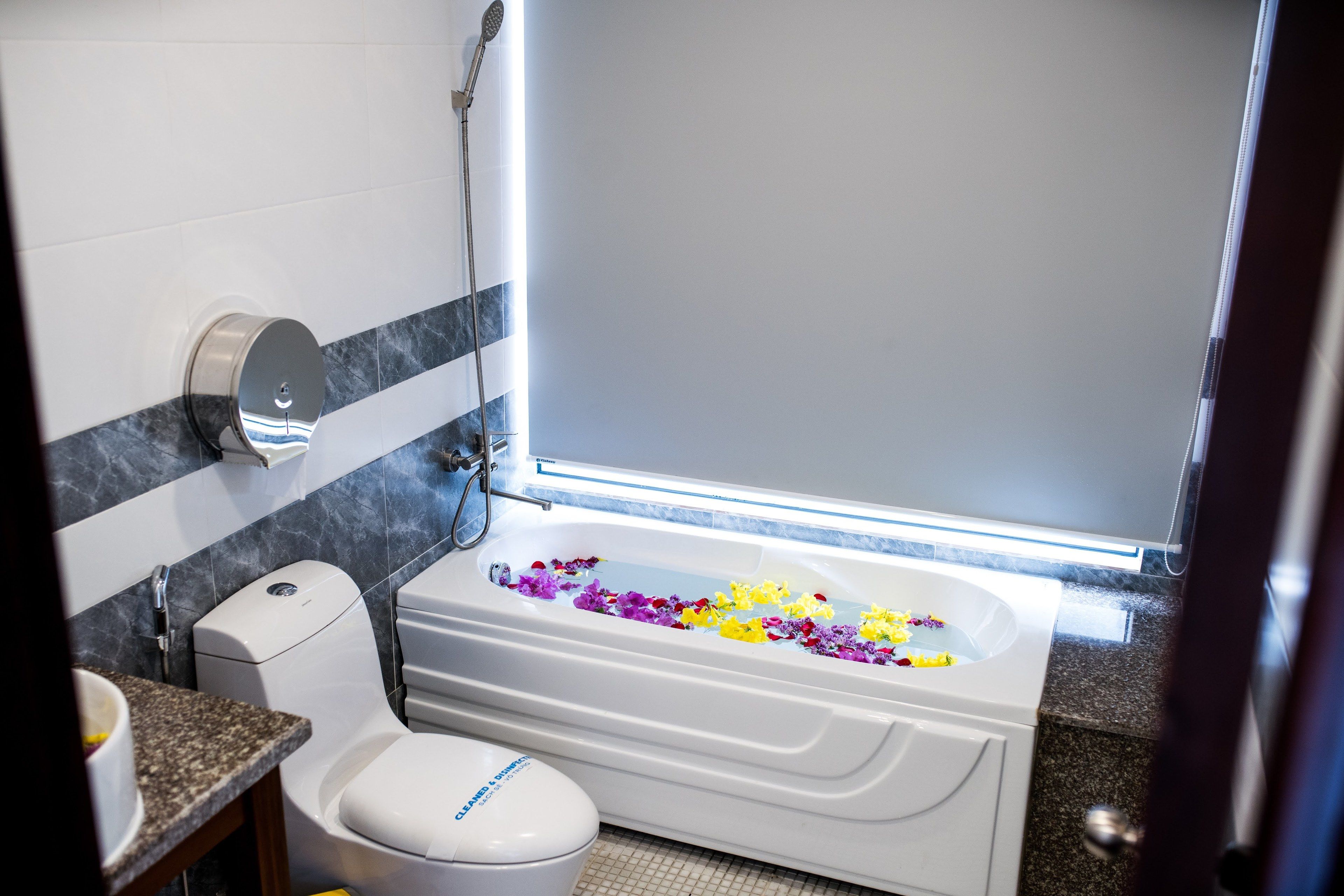 deep-soaking bathtub, rainfall showerhead, free toiletries, hair dryer