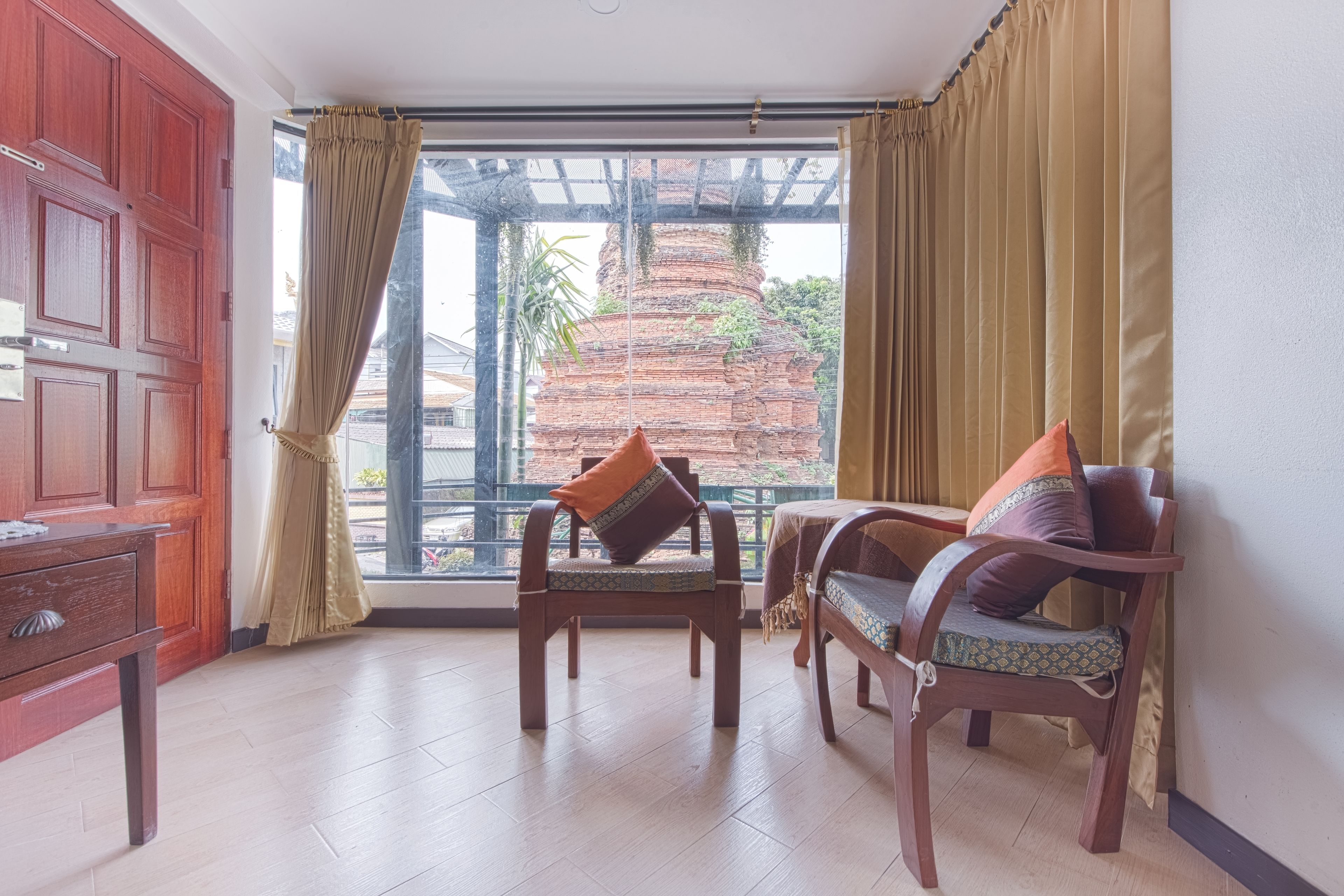 family double room, 2 double beds | living area | flat-screen tv