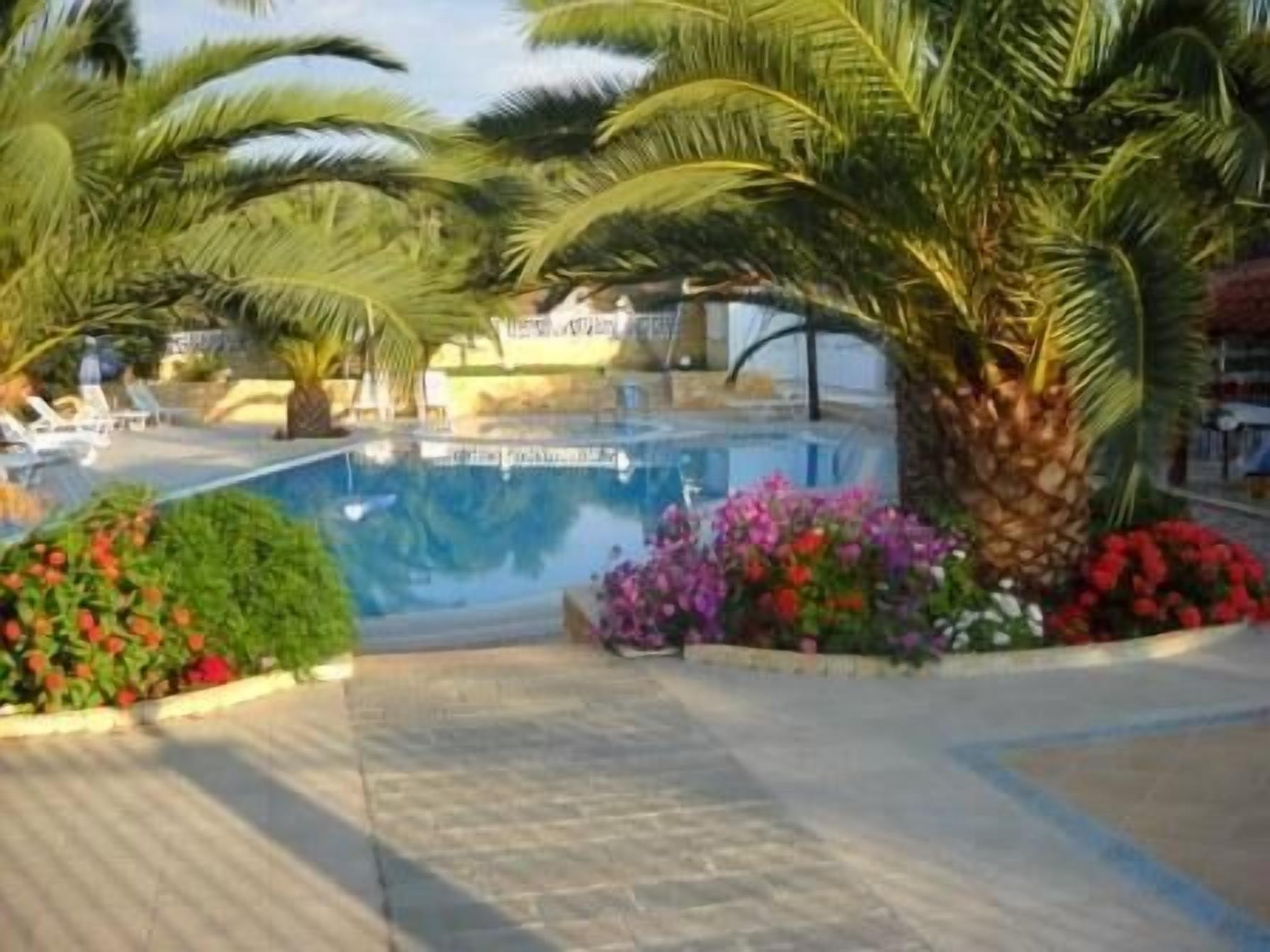 Outdoor pool, pool umbrellas, pool loungers