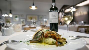 Breakfast, lunch, dinner served; Portuguese cuisine