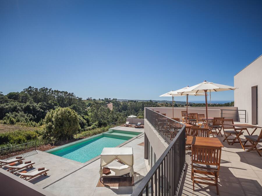 2 outdoor pools, pool umbrellas, pool loungers