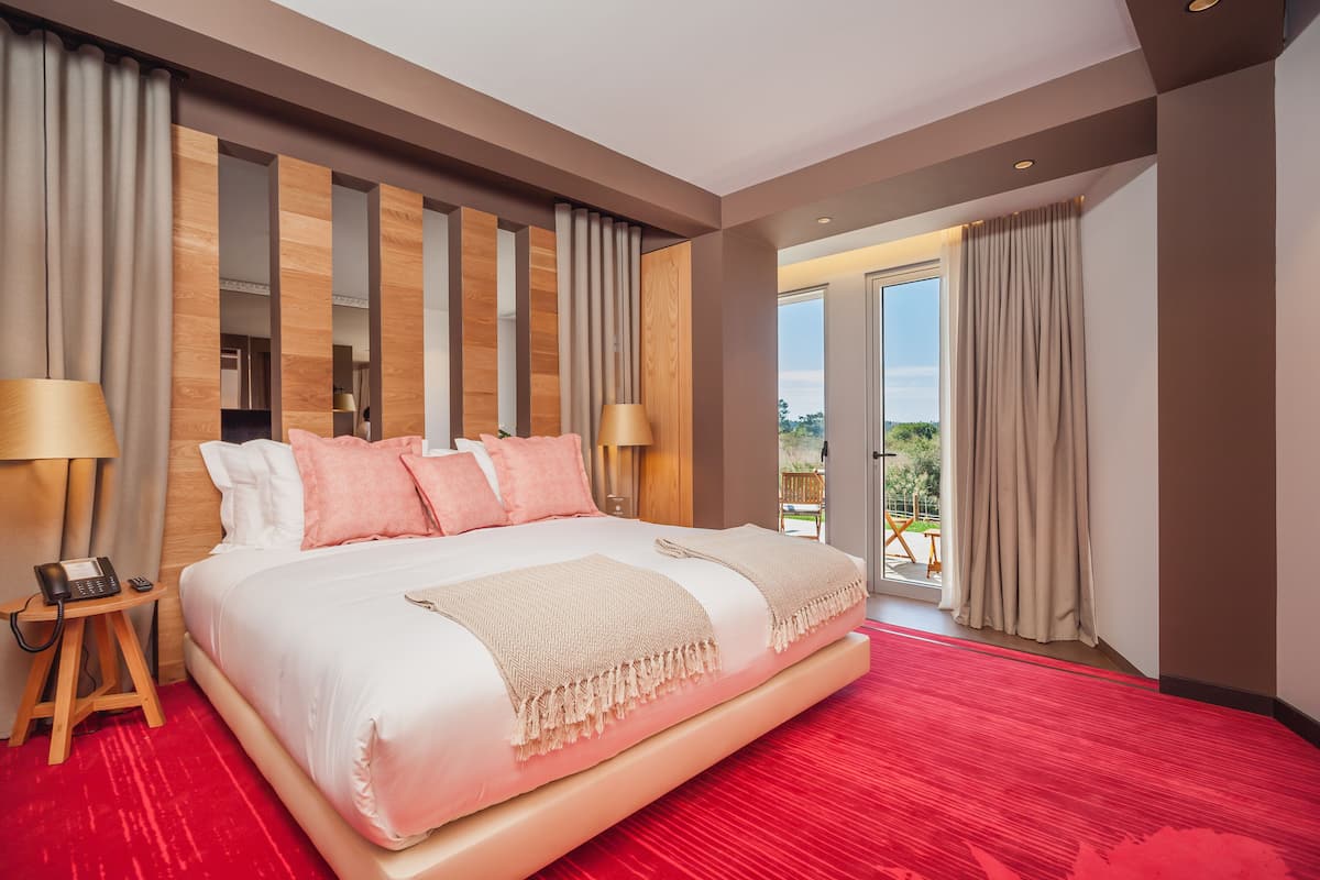 Suite Deluxe, 1 grand lit, balcon, niveau Exécutif