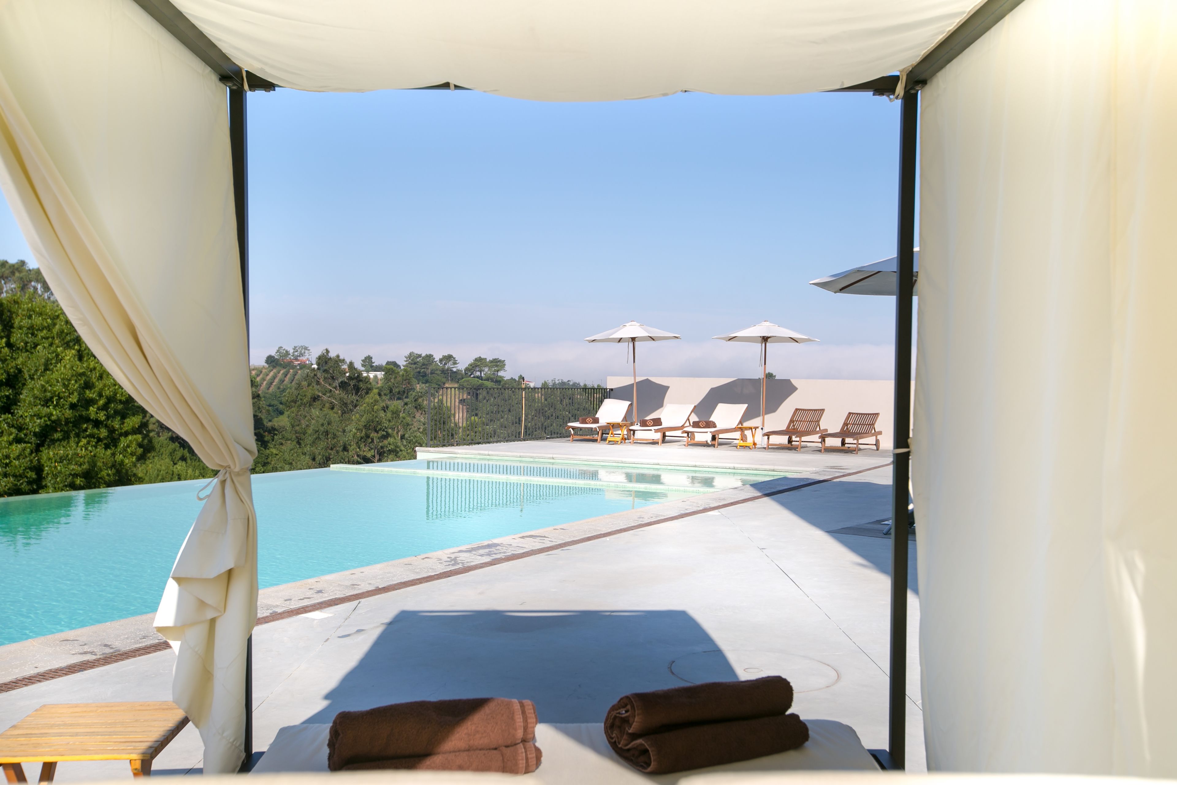 2 outdoor pools, pool umbrellas, pool loungers