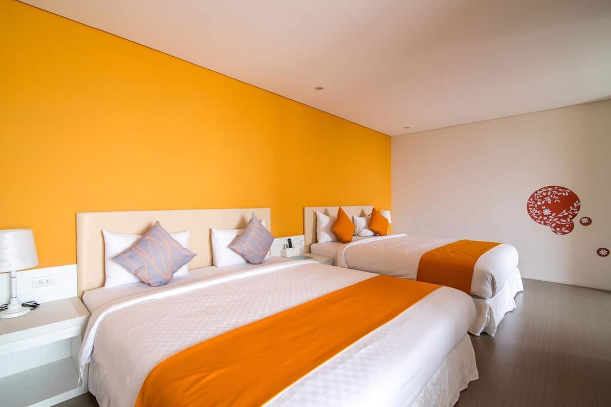 Deluxe Quadruple Room, Ocean View | Desk, blackout drapes, WiFi (free), individually decorated