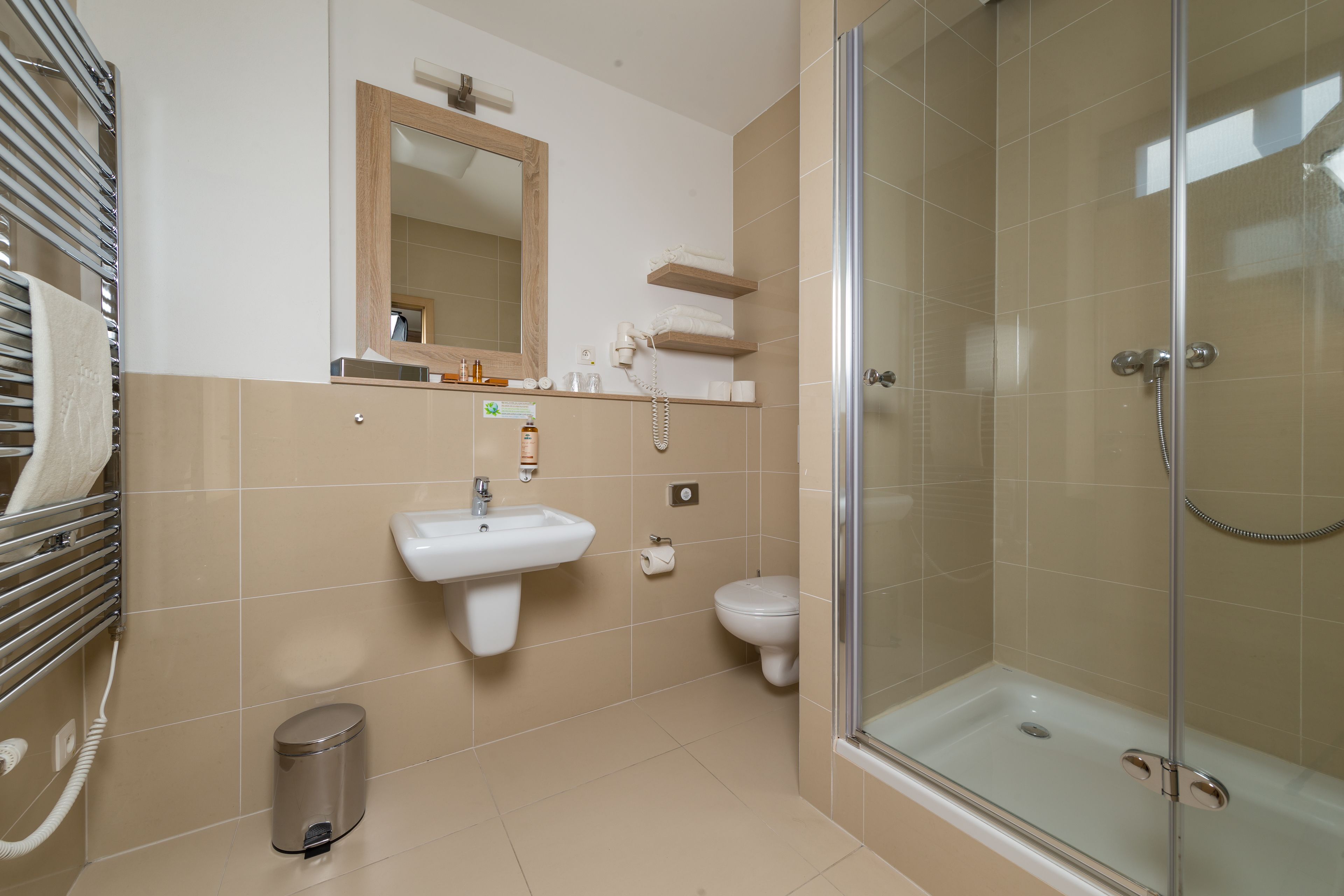 shower, free toiletries, bathrobes, slippers