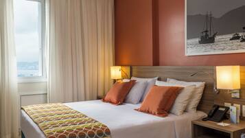 Quarto casal premium | Frigobar, cofres nos quartos, cortinas blackout, Wi-Fi de cortesia