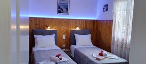 Quartos à prova de som, Wi-Fi de cortesia, roupa de cama