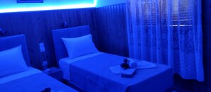 Quartos à prova de som, Wi-Fi de cortesia, roupa de cama