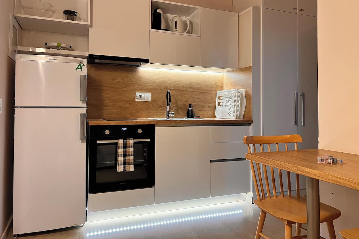 Deluxe Apartment, 1 Bedroom, Sea View | Private kitchen | Full-size fridge, microwave, stovetop, espresso maker