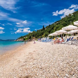 On the beach, sun-loungers, beach umbrellas, beach towels