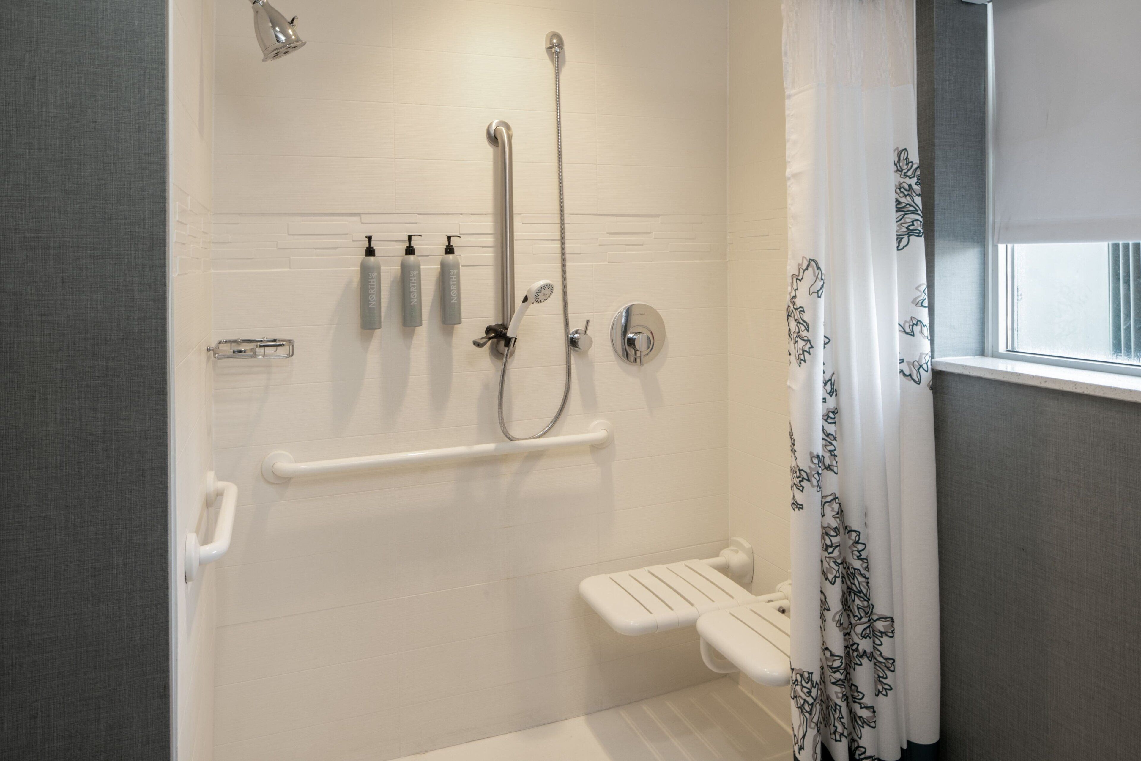 combined shower/bathtub, free toiletries, hair dryer, towels