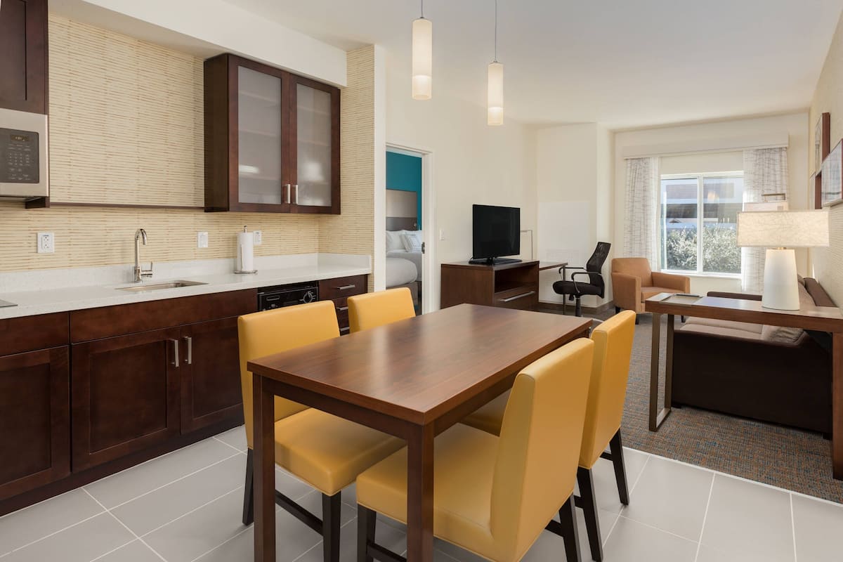 full-sized fridge, microwave, stovetop, dishwasher