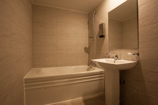 Combined shower/tub, hair dryer, bathrobes, slippers