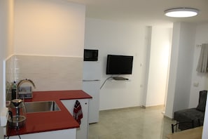 Appartement, 1 chambre | Restauration dans la chambre