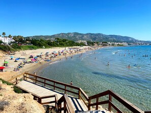 On the beach, white sand