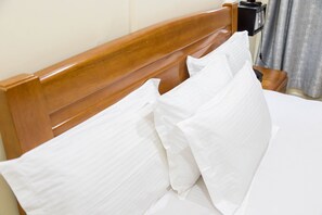 Executive Suite, 1 Bedroom, City View | Premium bedding, pillowtop beds, in-room safe, individually decorated - Olympic Hotel (Kigali)