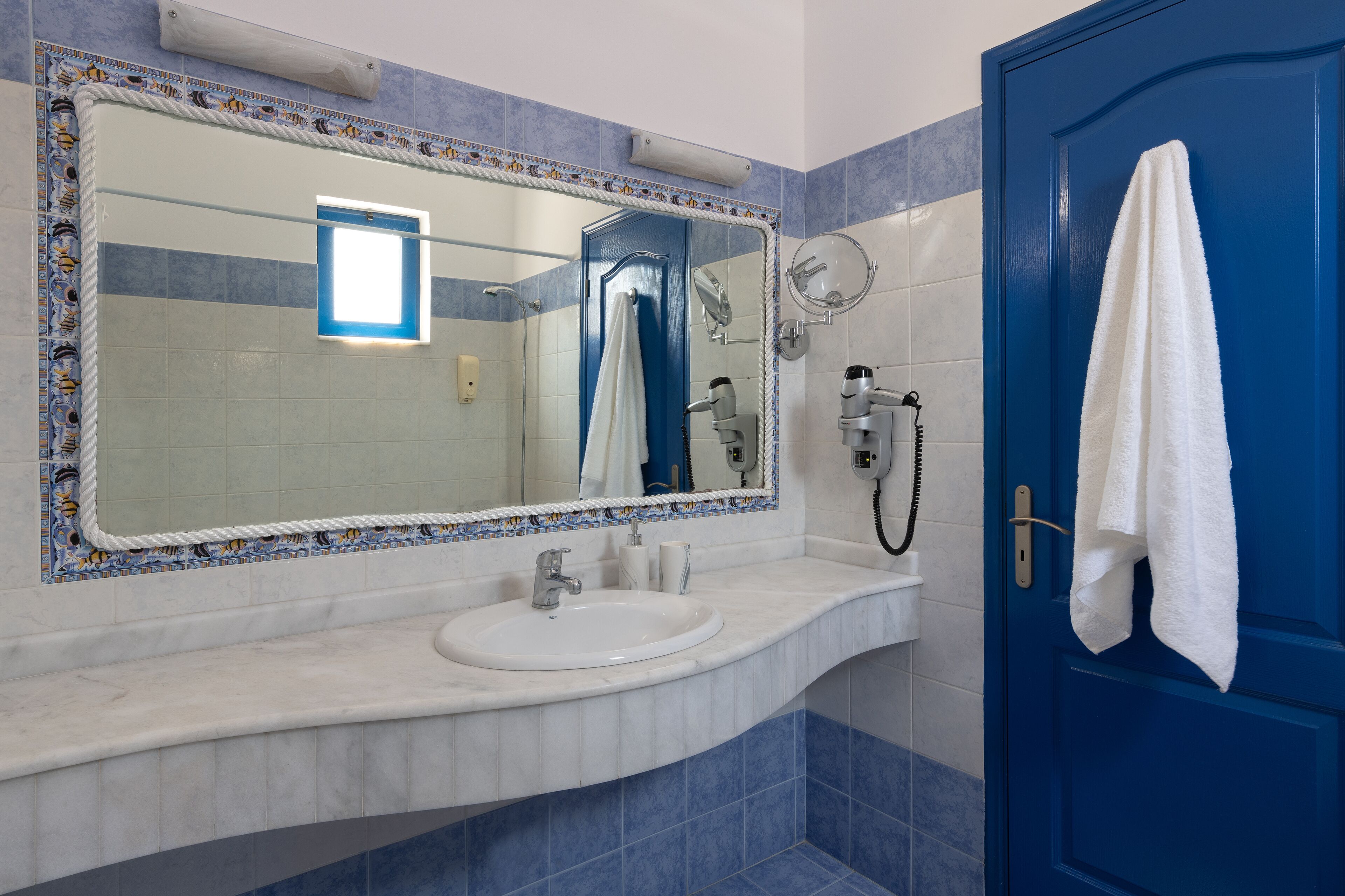 eco-friendly toiletries, hair dryer, towels