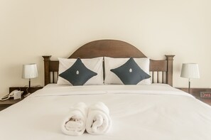 Standard Room, 1 King Bed | Minibar, in-room safe, desk, laptop workspace - Koranaree Courtyard Boutique Hotel (Nakhon Ratchasima)