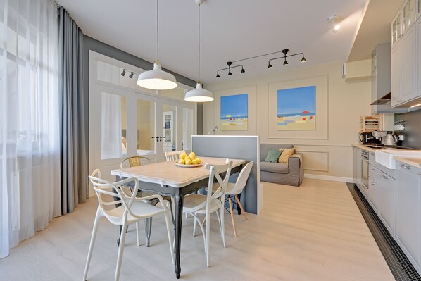 Deluxe Apartment, 2 Bedrooms, Balcony (living room, 6 adults ) | Living room | 40-inch flat-screen TV with cable channels, LCD TV