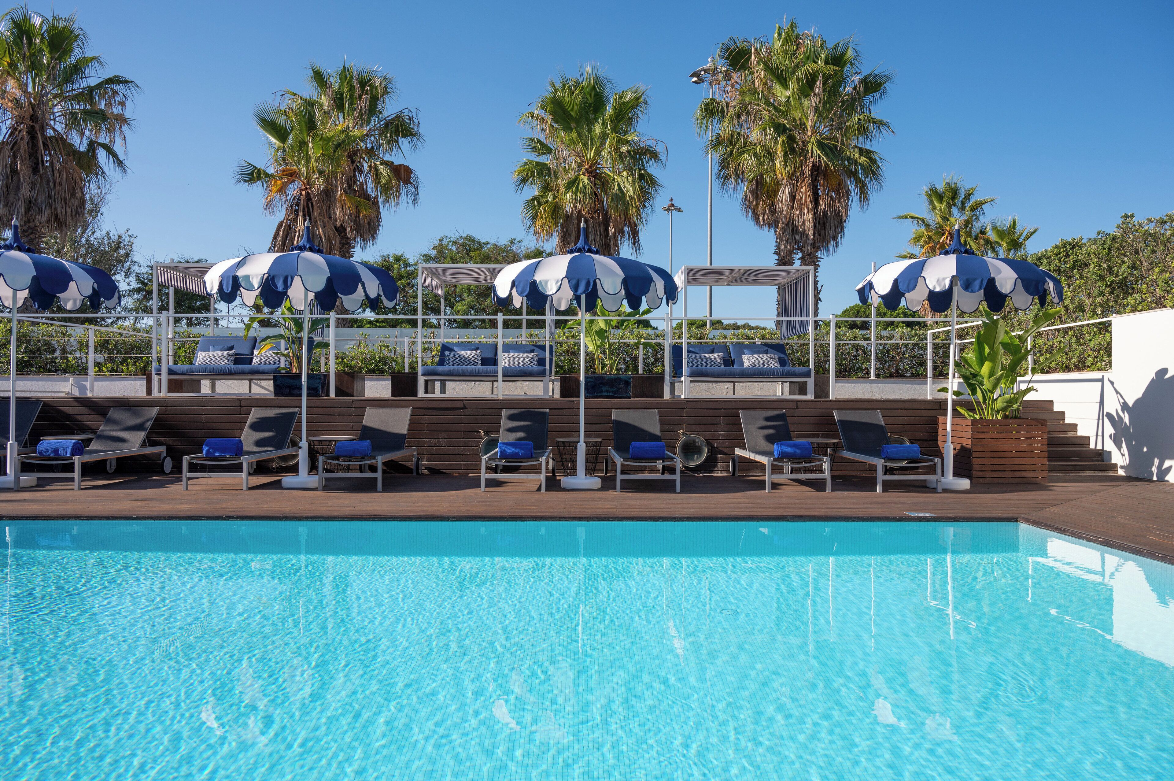 Indoor pool, outdoor pool, pool umbrellas, sun loungers