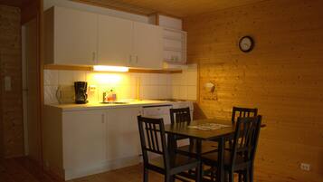 Apartment, 1 Bedroom, Patio | Private kitchenette | Fridge, stovetop, electric kettle