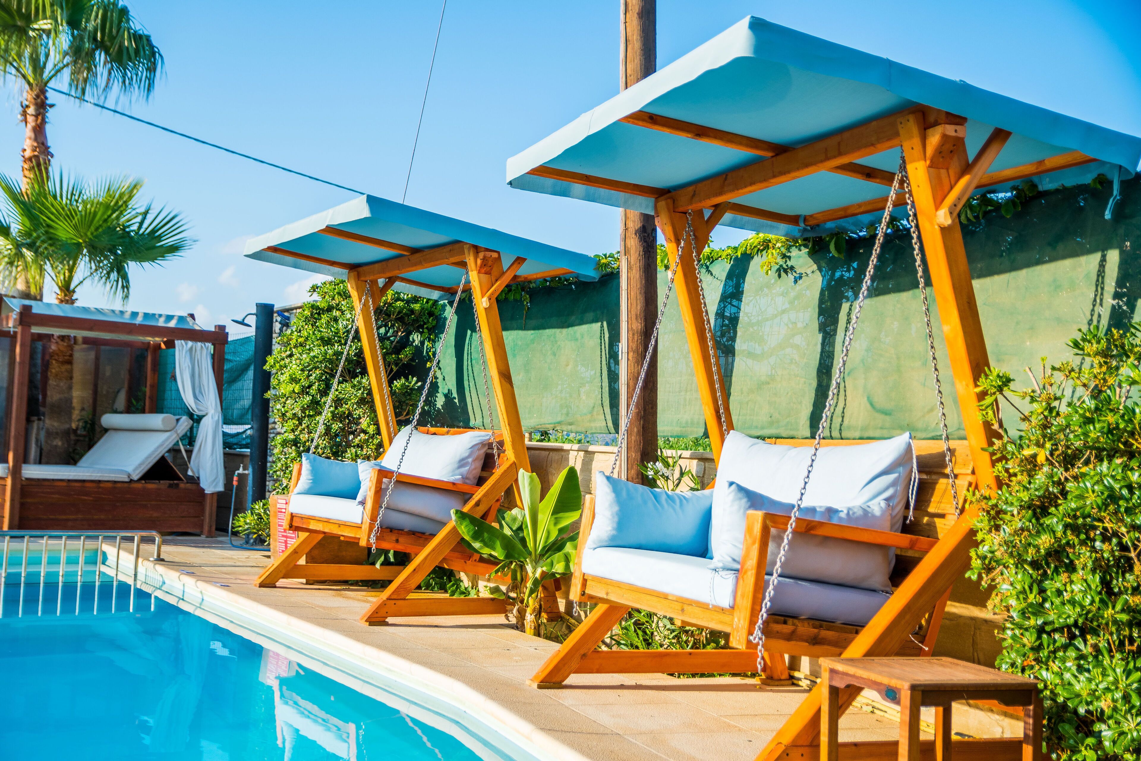 Seasonal outdoor pool, open 11:00 AM to 7:00 PM, free pool cabanas