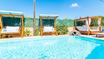 Seasonal outdoor pool, open 9:00 AM to 7:30 PM, free pool cabanas