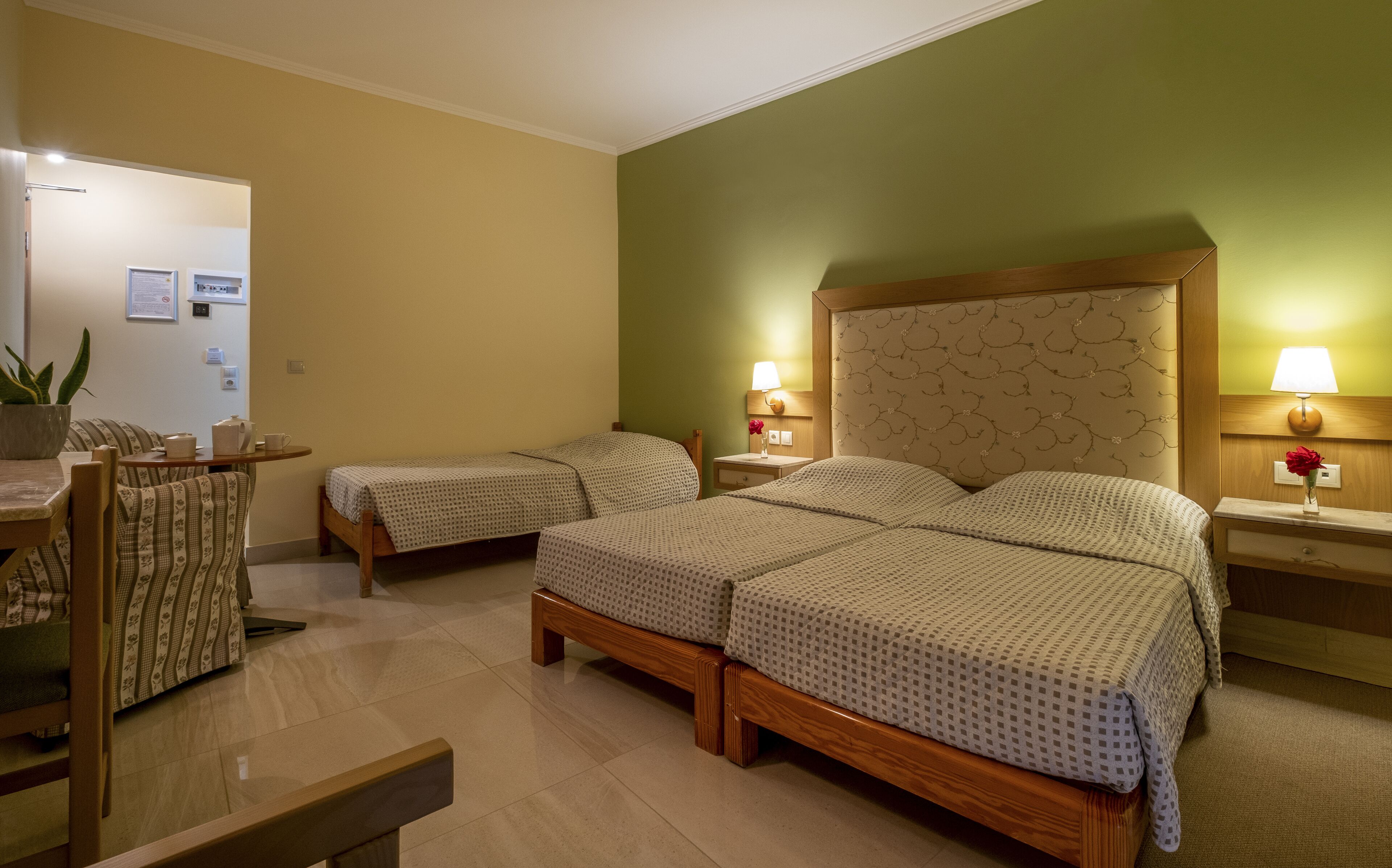 triple room (back view) | in-room safe, rollaway beds, free wifi