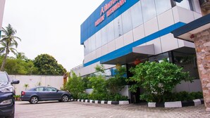 A modern building with a sign reading "Atlantic Restaurant." - Atlantic Hotel And Suites (Lagos)