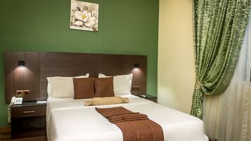 Desk, laptop workspace, free WiFi, bed sheets