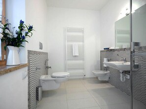 Quadruple Room | Bathroom | Shower, free toiletries, hair dryer, bathrobes