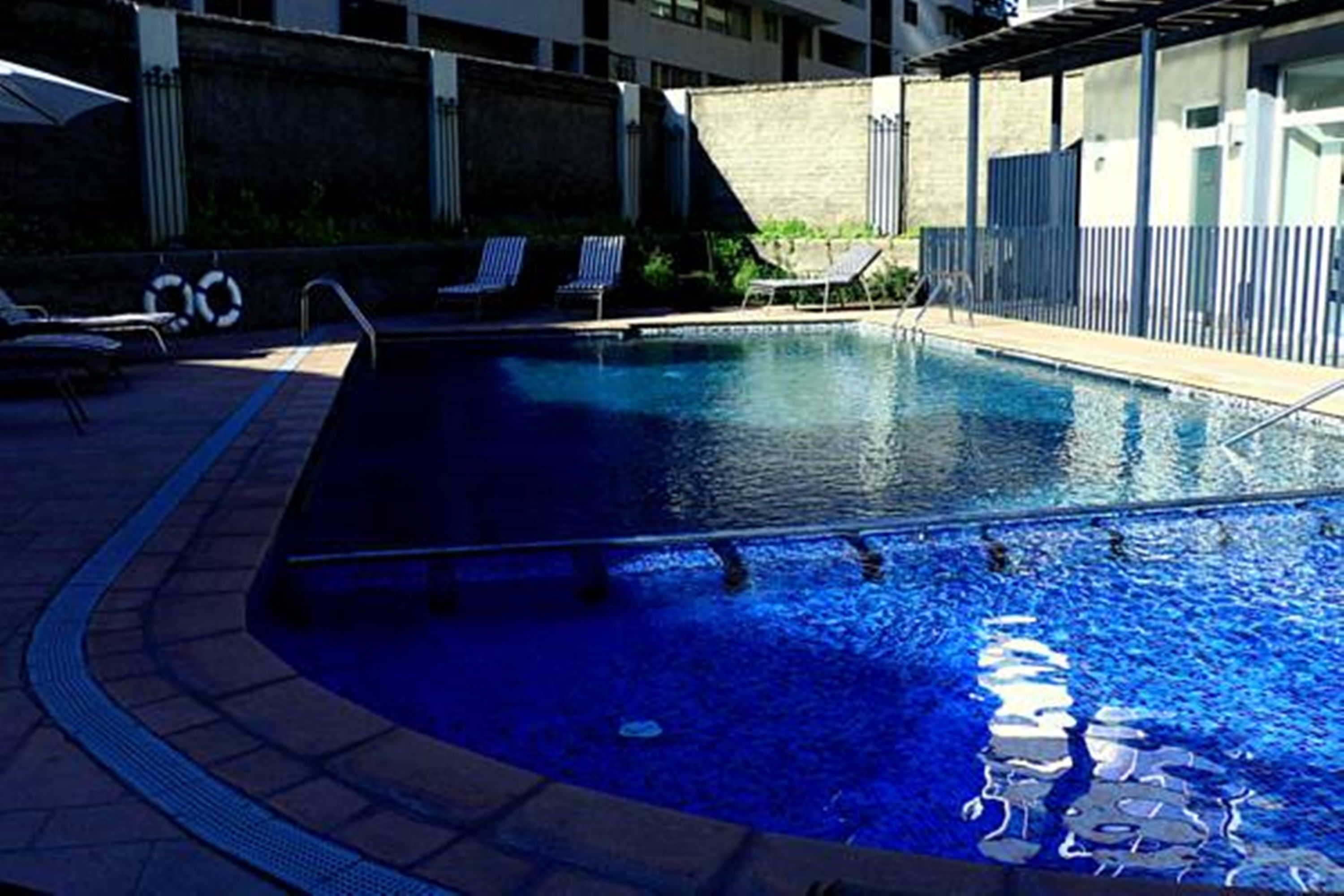 outdoor pool, pool loungers