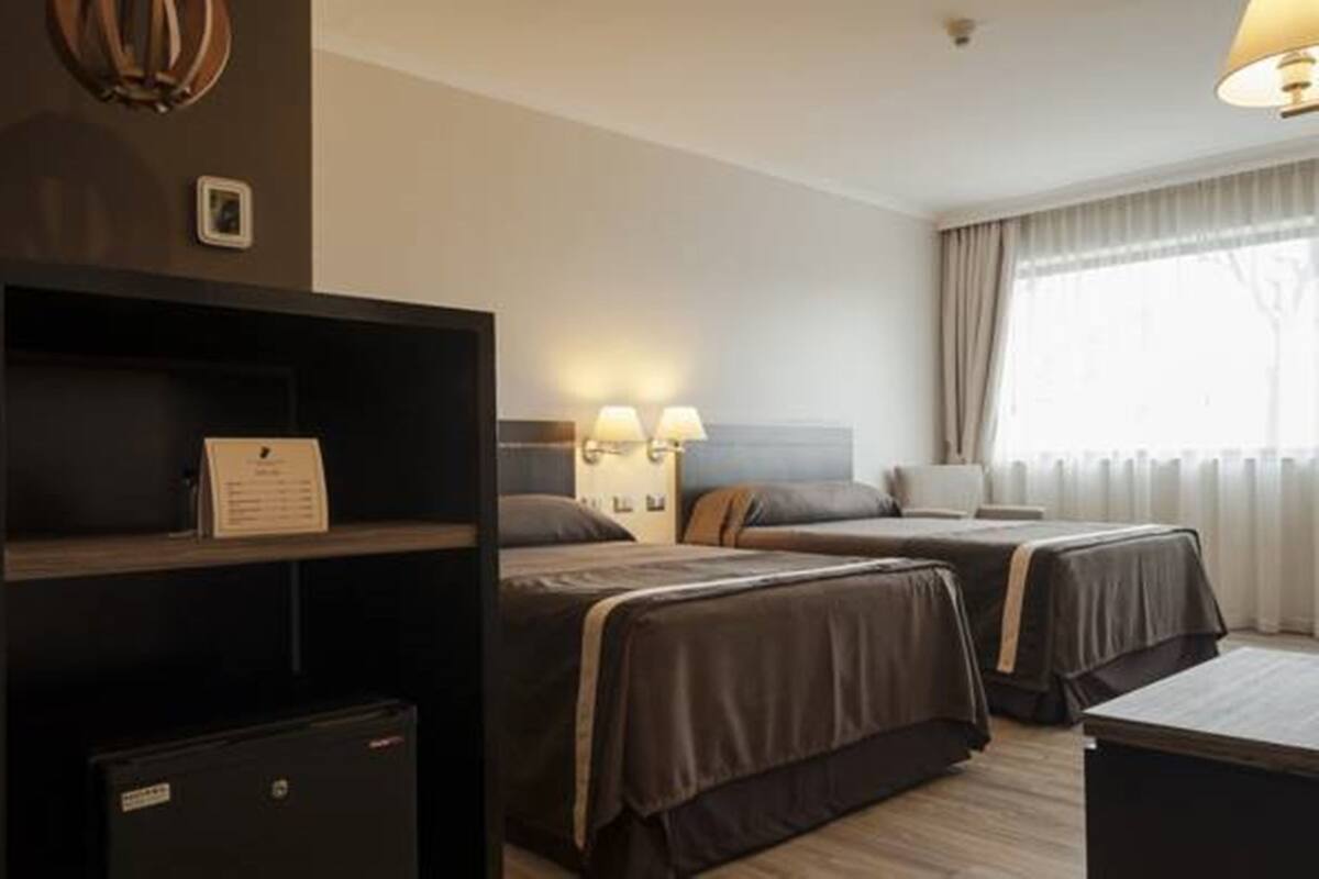 Classic Double Room | Minibar, in-room safe, blackout curtains, soundproofing