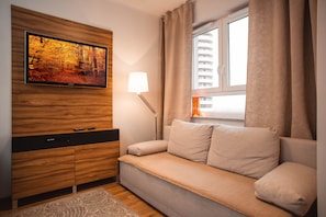 Comfort Apartment, Balcony | Living room