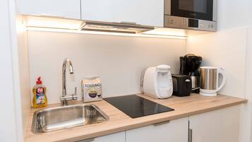 Apartment, Kitchen, City View (Cleaning Fee Included) | Private kitchen | Full-sized fridge, microwave, oven, stovetop