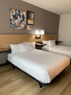Pillow-top beds, desk, laptop workspace, iron/ironing board