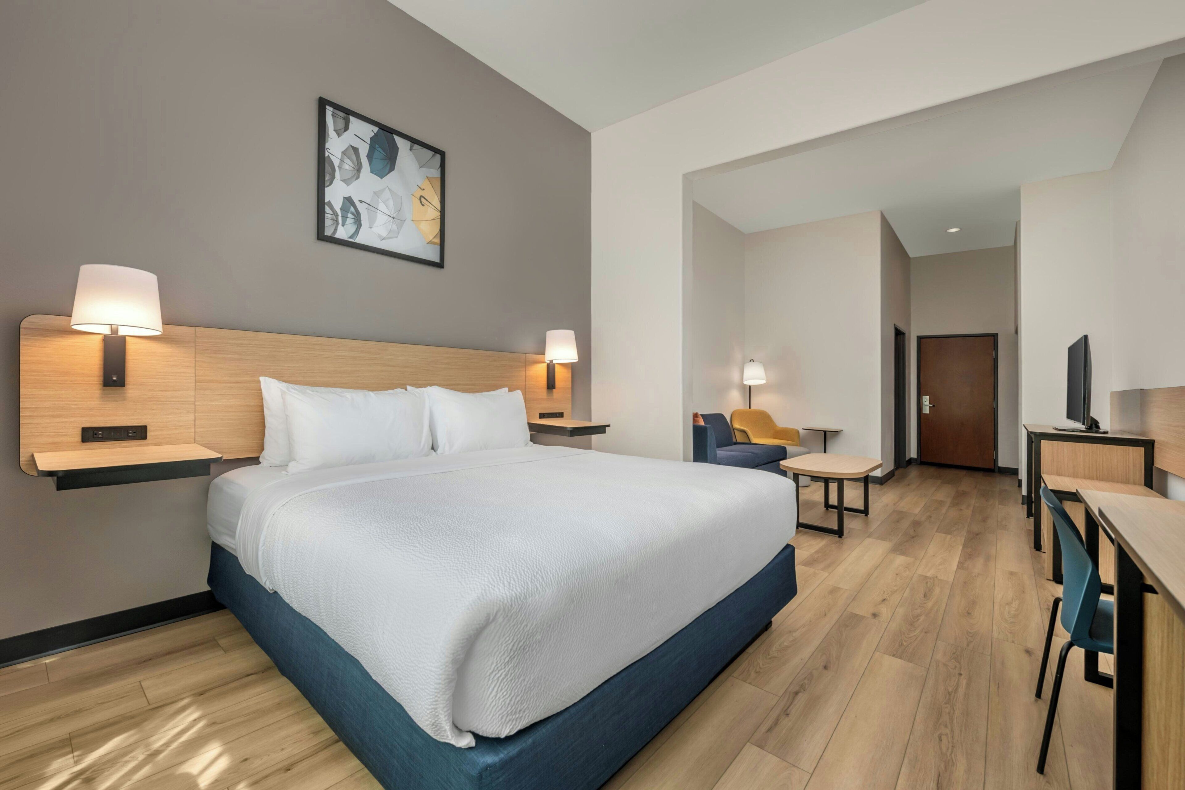 Room, 1 King Bed with Sofa bed | Pillowtop beds, desk, laptop workspace, iron/ironing board