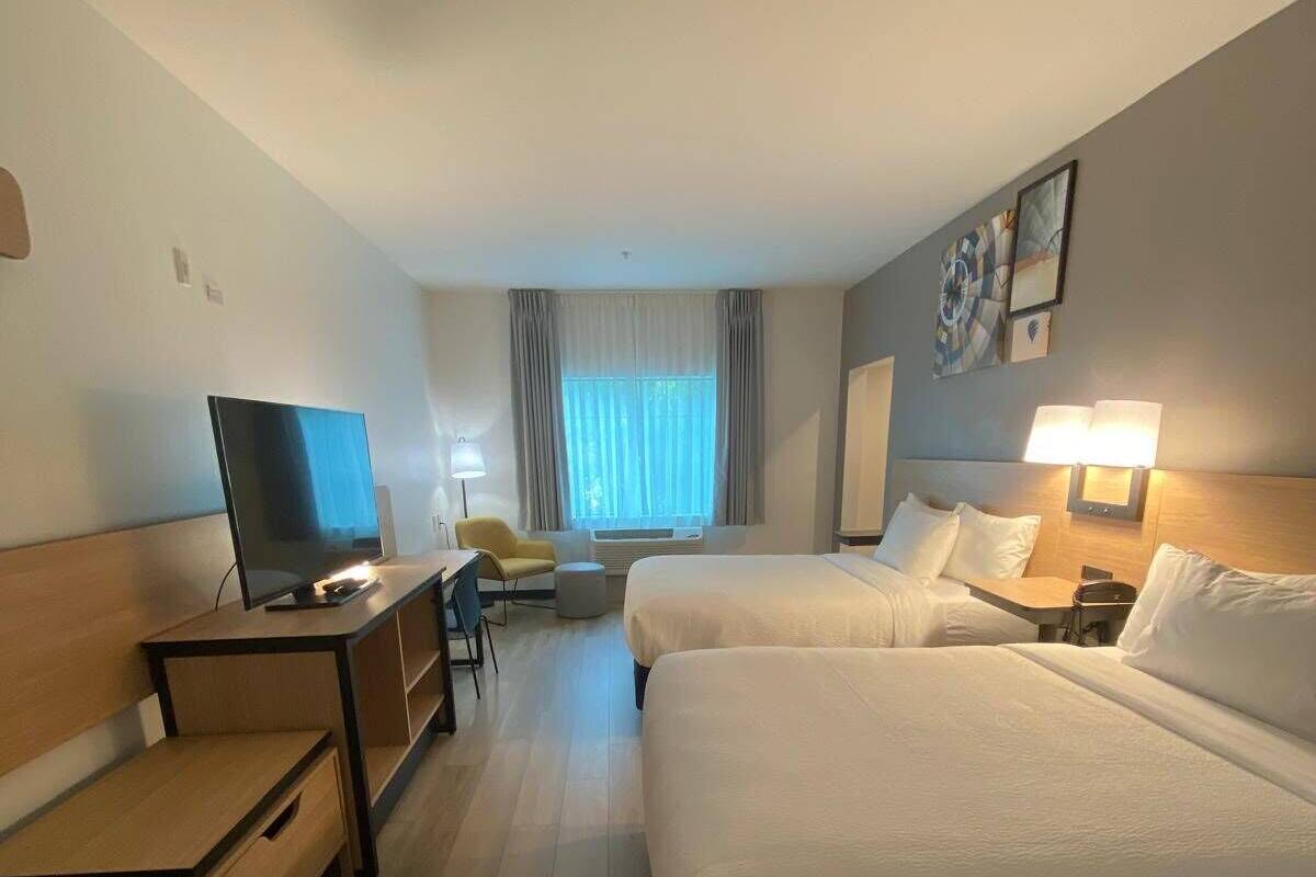 Pillow-top beds, desk, laptop workspace, iron/ironing board