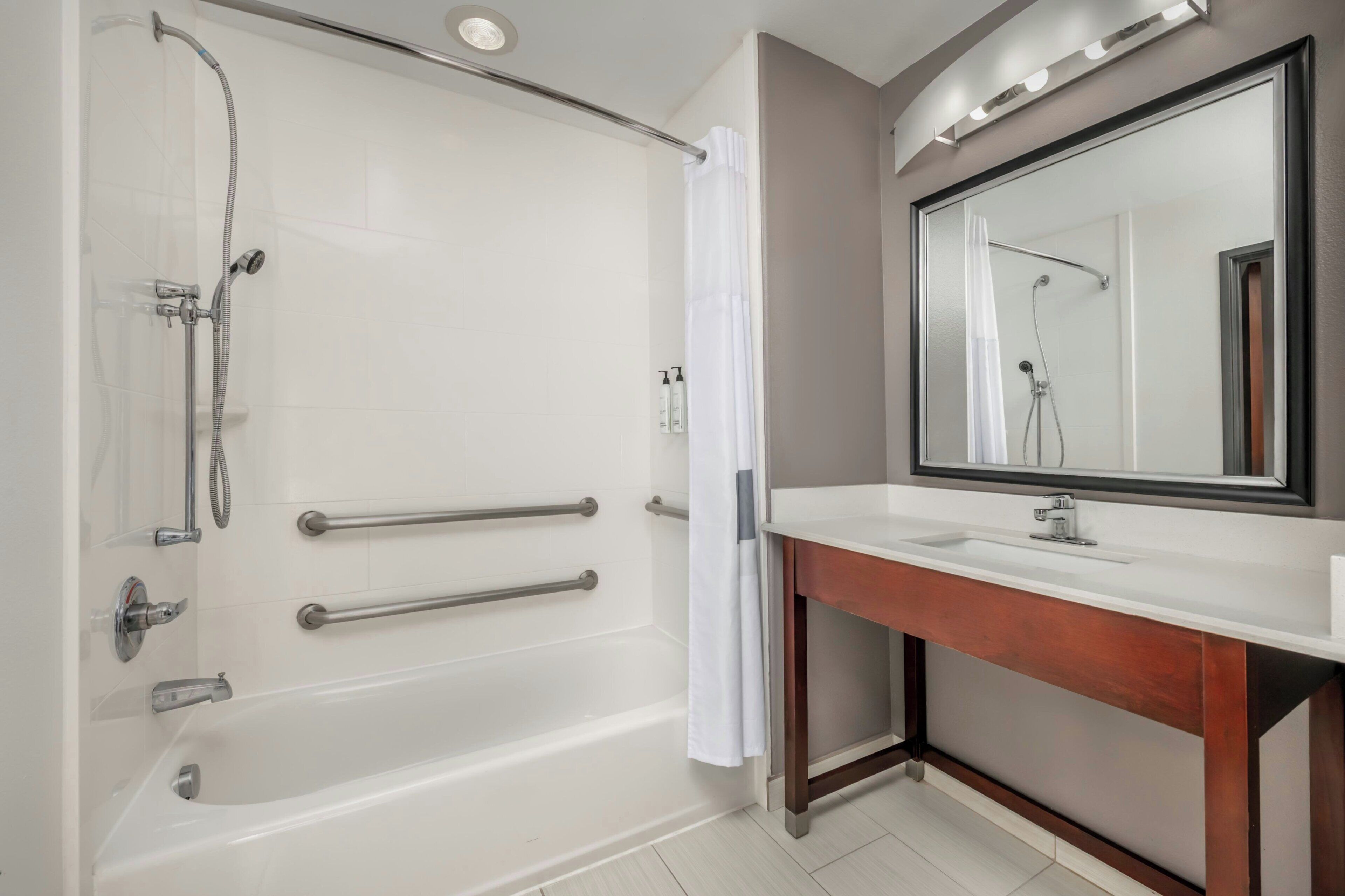Room, 2 Queen Beds | Bathroom | Combined shower/tub, free toiletries, hair dryer, towels