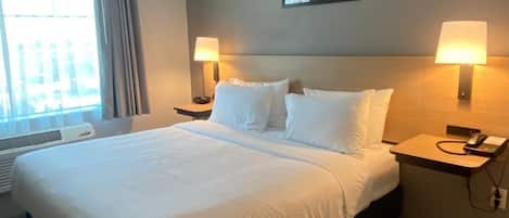 Room, 1 King Bed | Pillowtop beds, desk, laptop workspace, iron/ironing board