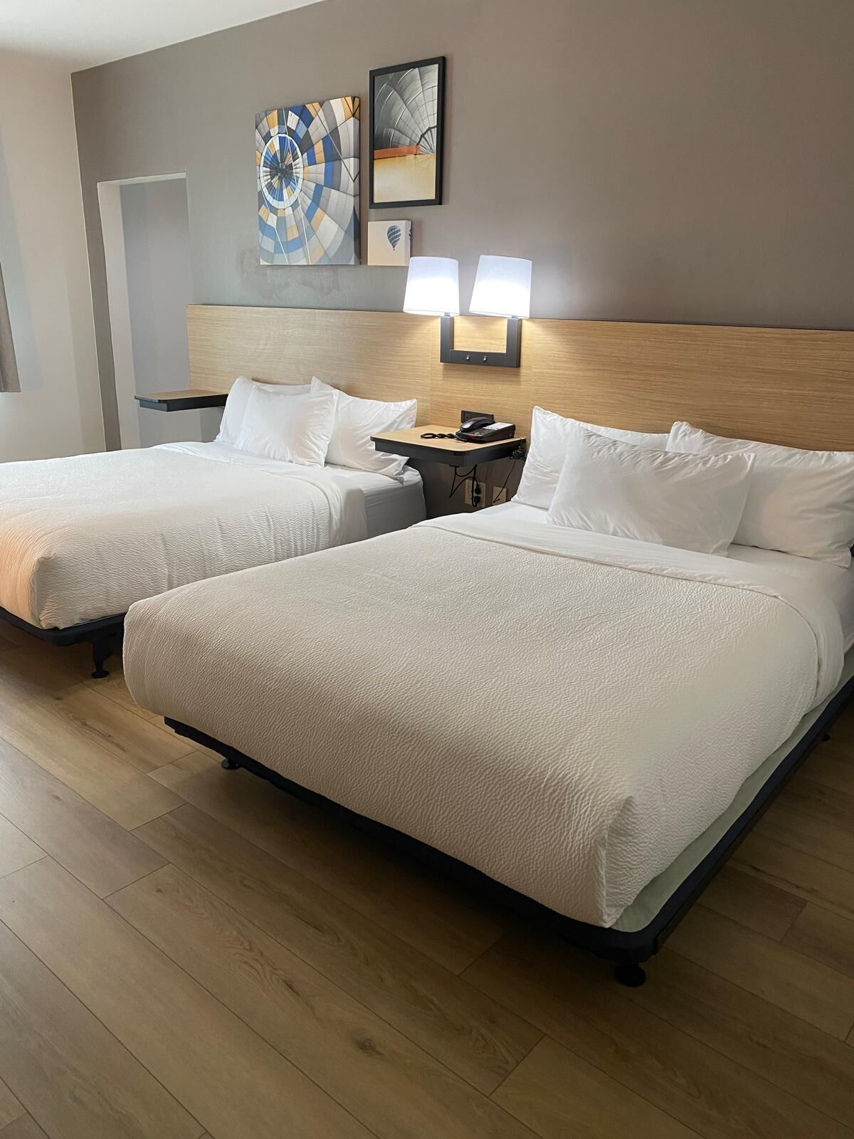 Pillowtop beds, desk, laptop workspace, iron/ironing board