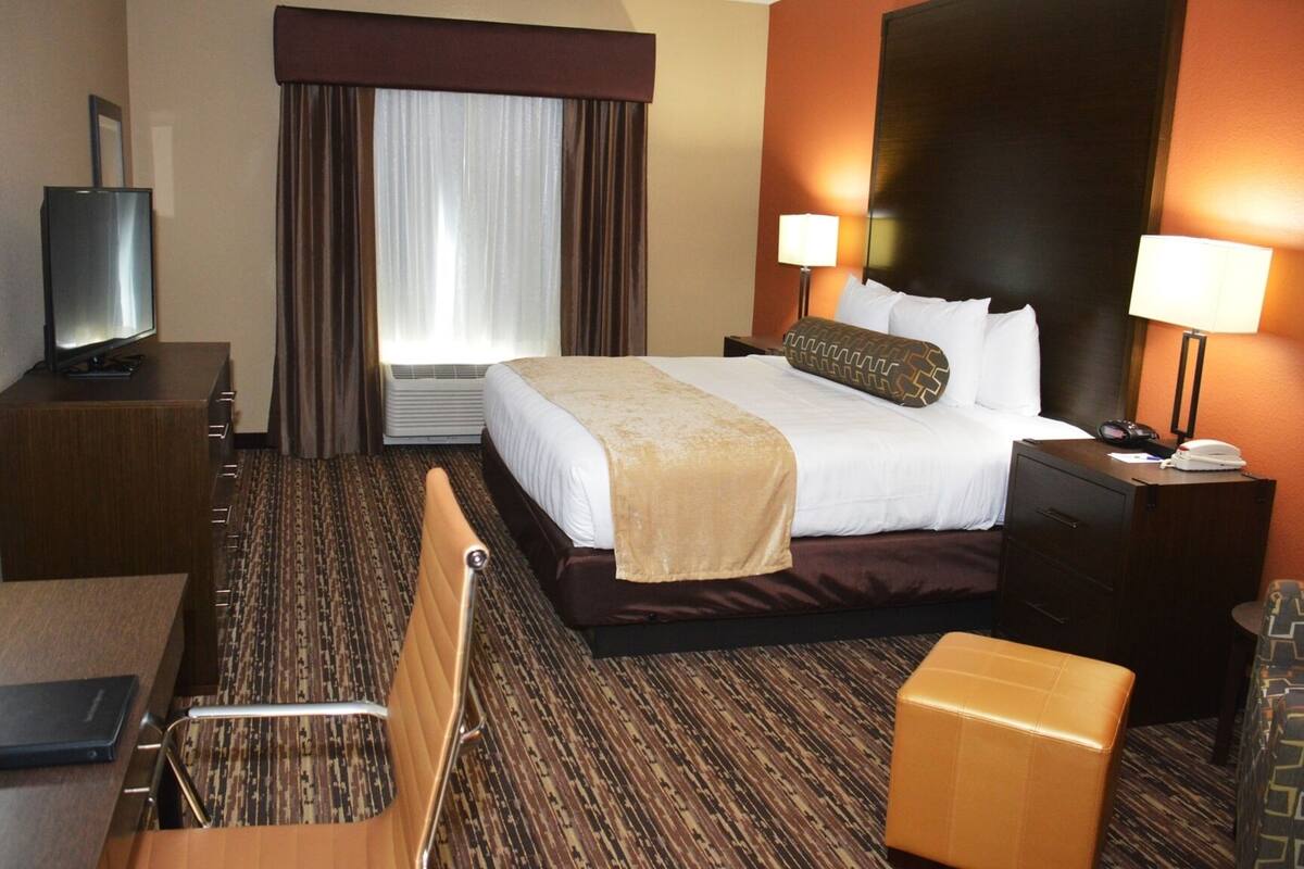 Premium bedding, pillow-top beds, desk, laptop workspace