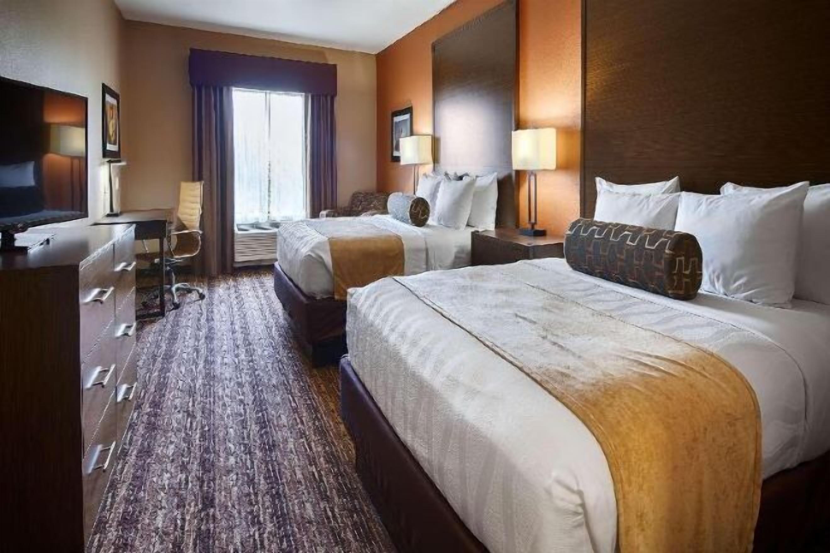 Premium bedding, pillowtop beds, desk, laptop workspace